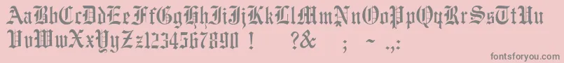 フォントJmhWulfilaNew – ピンクの背景に灰色の文字