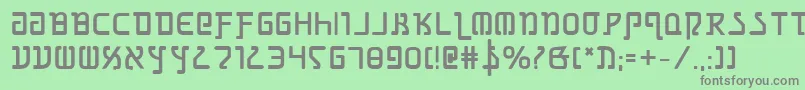 GrimlordBold-fontti – harmaat kirjasimet vihreällä taustalla