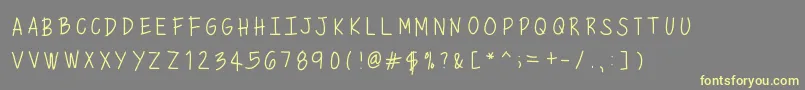 Mixminicaps Font – Yellow Fonts on Gray Background