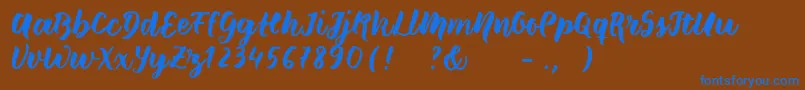 Wildcreaturessample-Schriftart – Blaue Schriften auf braunem Hintergrund