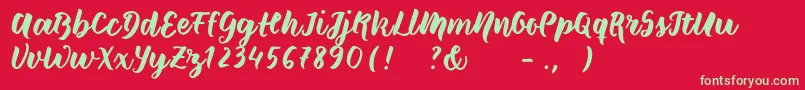 Czcionka Wildcreaturessample – zielone czcionki na czerwonym tle