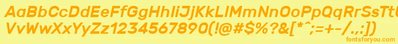 RubikMediumitalic-fontti – oranssit fontit keltaisella taustalla