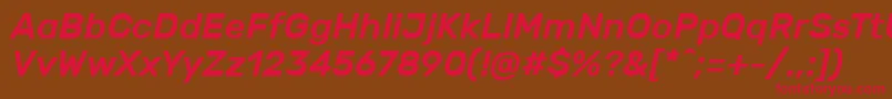 フォントRubikMediumitalic – 赤い文字が茶色の背景にあります。