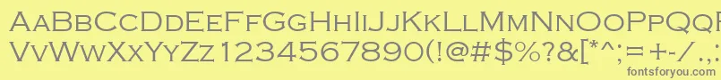 Copperplatetlig-fontti – harmaat kirjasimet keltaisella taustalla