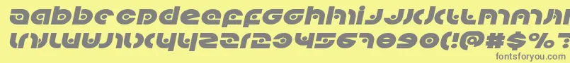 Kovacsspotexpandital-Schriftart – Graue Schriften auf gelbem Hintergrund