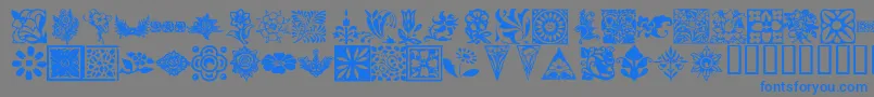 KrFleurishFloral-Schriftart – Blaue Schriften auf grauem Hintergrund