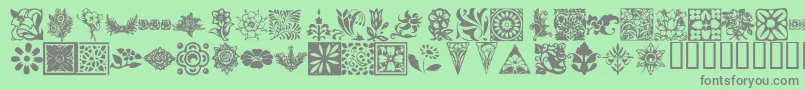 KrFleurishFloral Font – Gray Fonts on Green Background