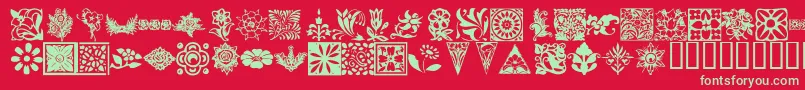 KrFleurishFloral-Schriftart – Grüne Schriften auf rotem Hintergrund