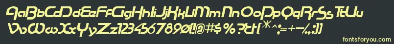 フォントRacetracsskItalic – 黒い背景に黄色の文字