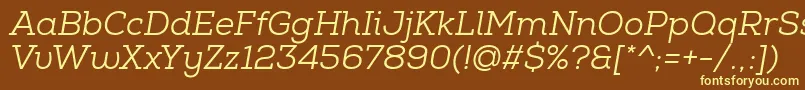 NexaSlabBookItalic-fontti – keltaiset fontit ruskealla taustalla