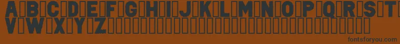 PunkRockColorFill-fontti – mustat fontit ruskealla taustalla