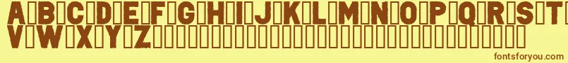 フォントPunkRockColorFill – 茶色の文字が黄色の背景にあります。