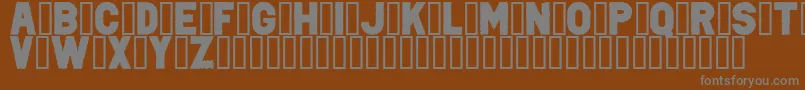 PunkRockColorFill-Schriftart – Graue Schriften auf braunem Hintergrund