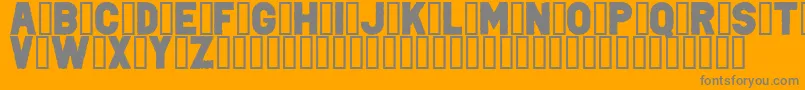 PunkRockColorFill-fontti – harmaat kirjasimet oranssilla taustalla