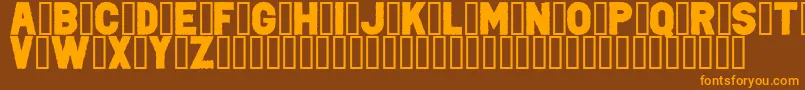 フォントPunkRockColorFill – オレンジ色の文字が茶色の背景にあります。
