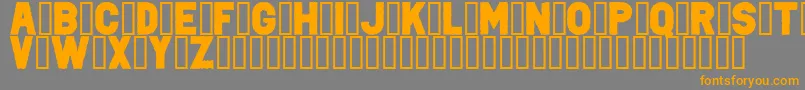 フォントPunkRockColorFill – オレンジの文字は灰色の背景にあります。