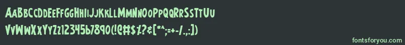 フォントEarths Mightiest Bold – 黒い背景に緑の文字
