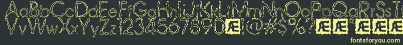 RavagedByYearsBrk Font – Yellow Fonts on Black Background