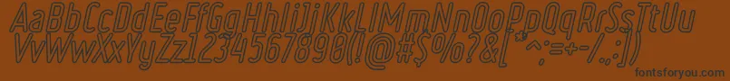 フォントRulerVolumeOutline – 黒い文字が茶色の背景にあります
