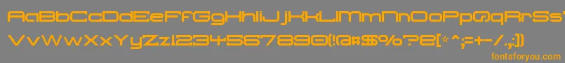 フォントTroglo – オレンジの文字は灰色の背景にあります。