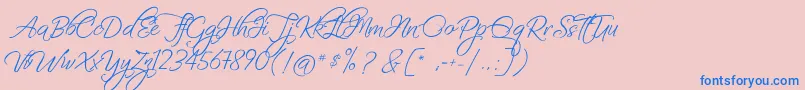 FascinatingChristmas-Schriftart – Blaue Schriften auf rosa Hintergrund
