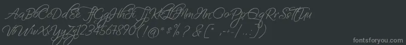 FascinatingChristmas-Schriftart – Graue Schriften auf schwarzem Hintergrund