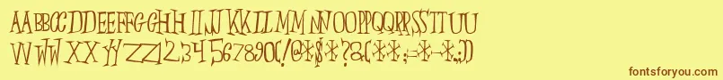 フォントSlumberp – 茶色の文字が黄色の背景にあります。