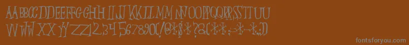 Slumberp-fontti – harmaat kirjasimet ruskealla taustalla