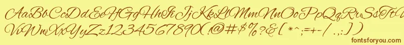 AlexbrushRegular-fontti – ruskeat fontit keltaisella taustalla
