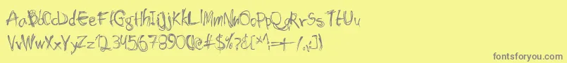 Shockhea-Schriftart – Graue Schriften auf gelbem Hintergrund