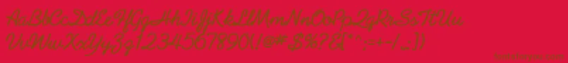GeArabesqueScriptBold-Schriftart – Braune Schriften auf rotem Hintergrund