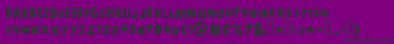 フォントJustADreamSolid – 紫の背景に黒い文字