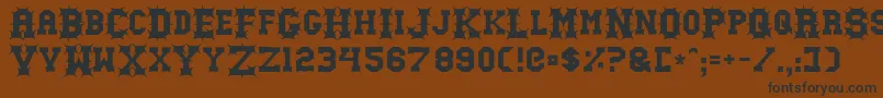 GutcruncherNormal Font – Black Fonts on Brown Background