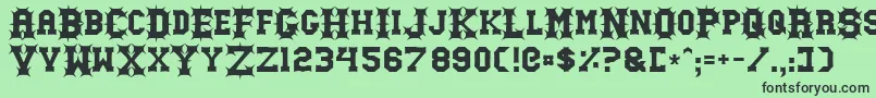 GutcruncherNormal Font – Black Fonts on Green Background