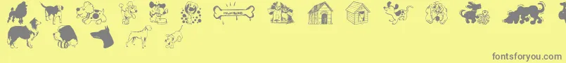 フォントDogsCsp – 黄色の背景に灰色の文字