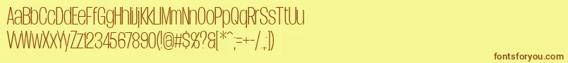 フォントDueraCondthinPersonal – 茶色の文字が黄色の背景にあります。