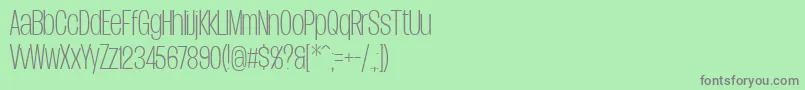 フォントDueraCondthinPersonal – 緑の背景に灰色の文字