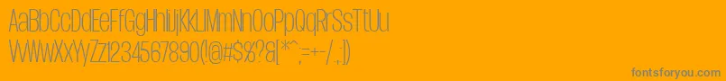 DueraCondthinPersonal-Schriftart – Graue Schriften auf orangefarbenem Hintergrund