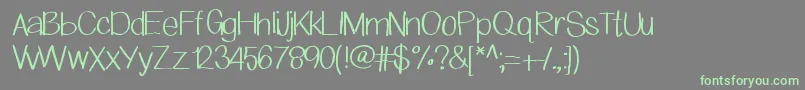 フォントMacyandkarafont – 灰色の背景に緑のフォント
