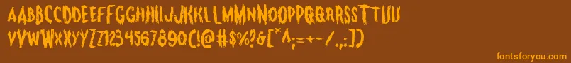 Monsteramaexpand-Schriftart – Orangefarbene Schriften auf braunem Hintergrund