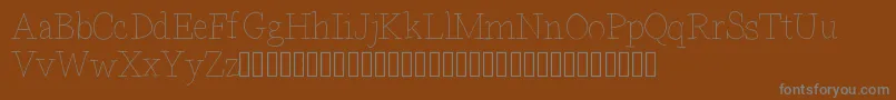 フォントBdparisdemo – 茶色の背景に灰色の文字