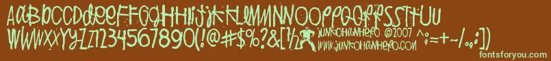 PuoliIhminen Font – Green Fonts on Brown Background