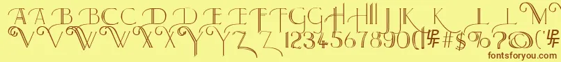 フォントLarkinCapitals – 茶色の文字が黄色の背景にあります。