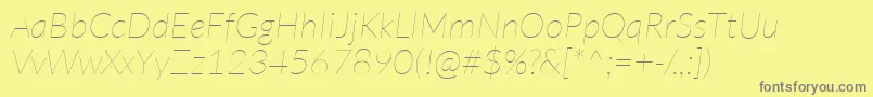 LatoHairlineitalic-Schriftart – Graue Schriften auf gelbem Hintergrund