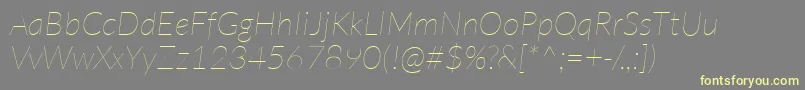 Fonte LatoHairlineitalic – fontes amarelas em um fundo cinza