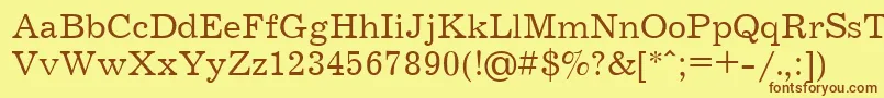 JournalCyrillic Font – Brown Fonts on Yellow Background