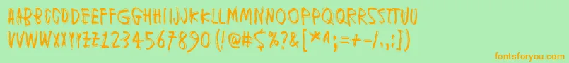 MuspiMerolKrad Font – Orange Fonts on Green Background