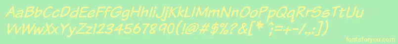 KomikaTextItalic Font – Yellow Fonts on Green Background