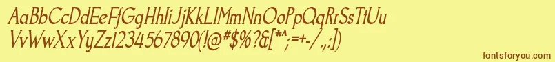 フォントGoodfishRgIt – 茶色の文字が黄色の背景にあります。