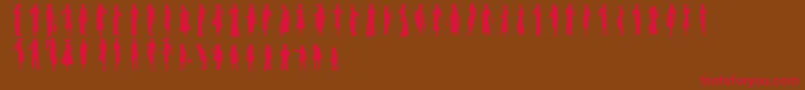 Sewingpatterns2 Font – Red Fonts on Brown Background